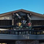 DISTANCE SHOT OF SCULPTURE & LIBRARY FROM STREET BELOW
